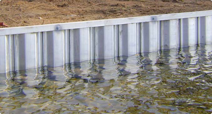 Seawall Construction in Milford, MI | Pond Place of Michigan - Steel_Seawall